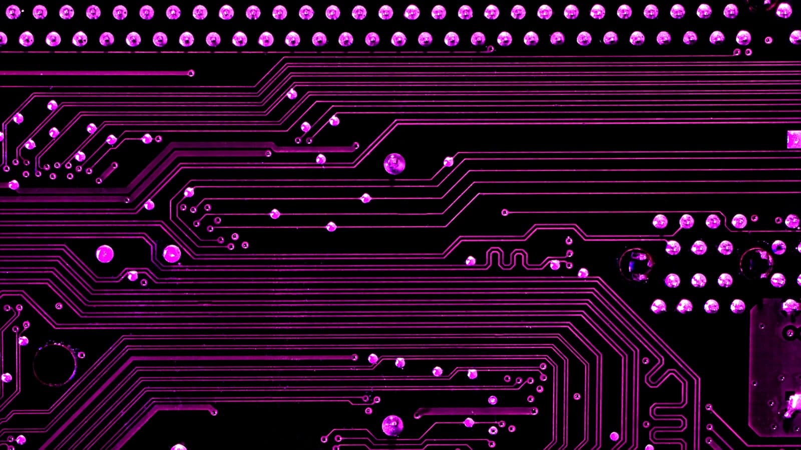Macro photograph of an illuminated computer circuit board